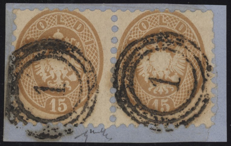 Lombardo Veneto - <p><strong>1864 - Aquila 15 soldi</strong>, n° 45, splendida coppia orizzontale su piccolo frammento&nbsp;annullata in Austria con bollo distribuzione "1" di Vienna (pt. 11), interessante occasione. &nbsp;Firmato Chiavarello e certificato Enzo Diena (1986).</p>